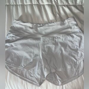 Lululemon White Speed ups. Size 4 4”.
